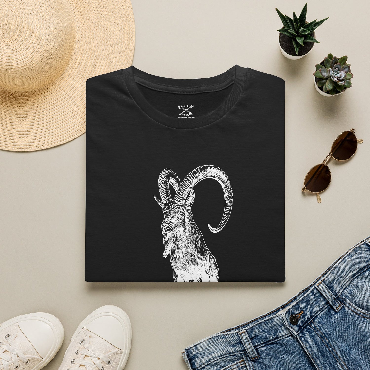 The Krikri Dark Shirt featuring a graphic of the iconic Kri-Kri goat on a black tee.